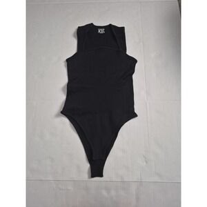 OQQ Women's Black Ribbed Stretch Bodysuit Size M Strap Button Accents